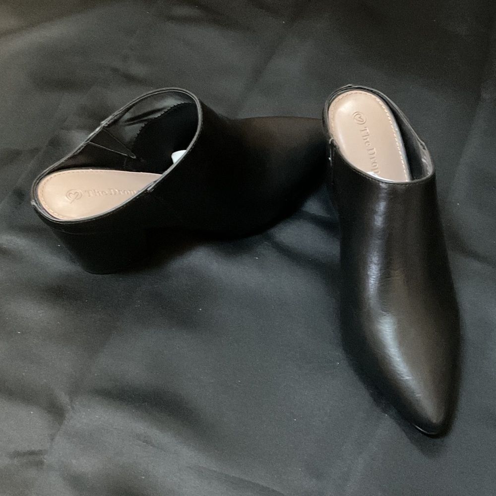 Chic Black Leather Mules by Earthbound